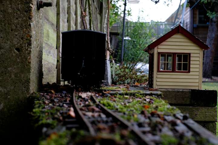 End of coach and small station building, autumn