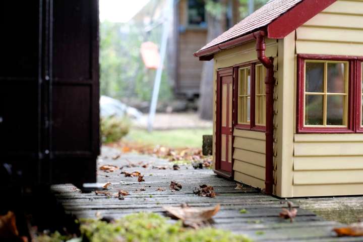 Small station building, leaves on platform